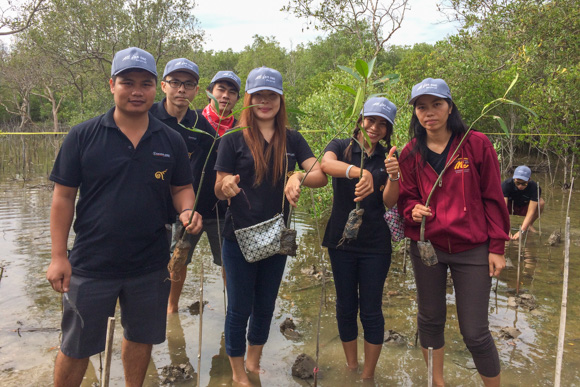 I-PEX Thailand employees and partners gathered during an outdoor sustainability activity