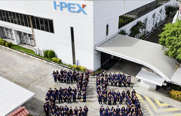 I-PEX Thailand employees forming the number 25 outside the factory to mark the company’s 25th anniversary